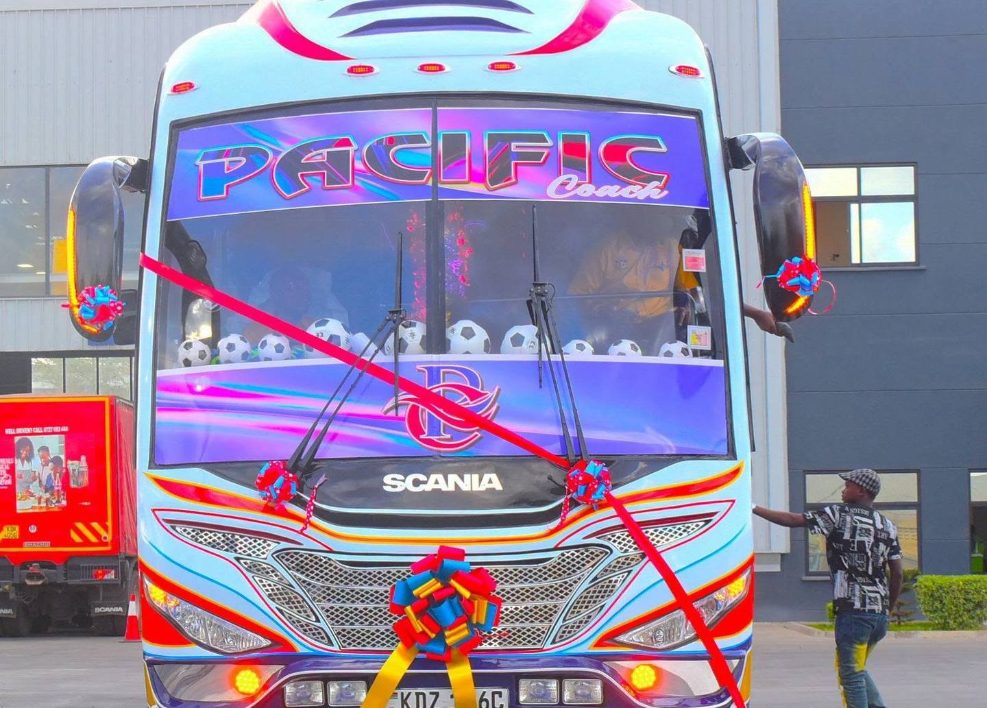 Front of a Pacific Coach with the Pacific Coach name across the windscreen